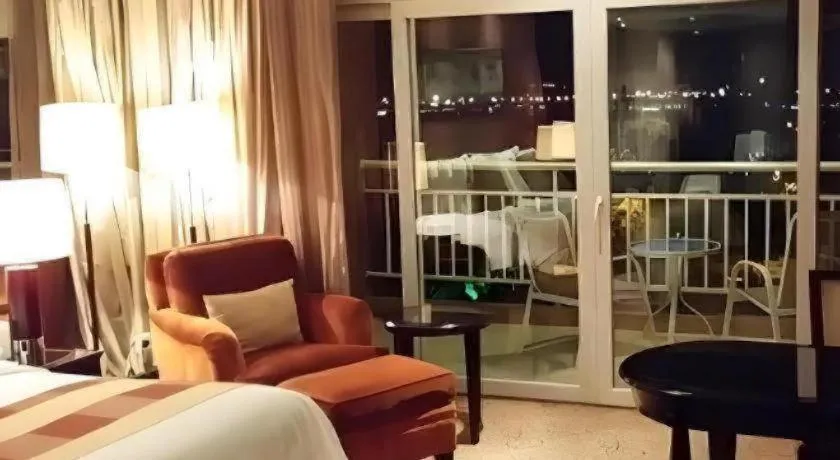 Bed in New Century Grand Hotel Xuzhou