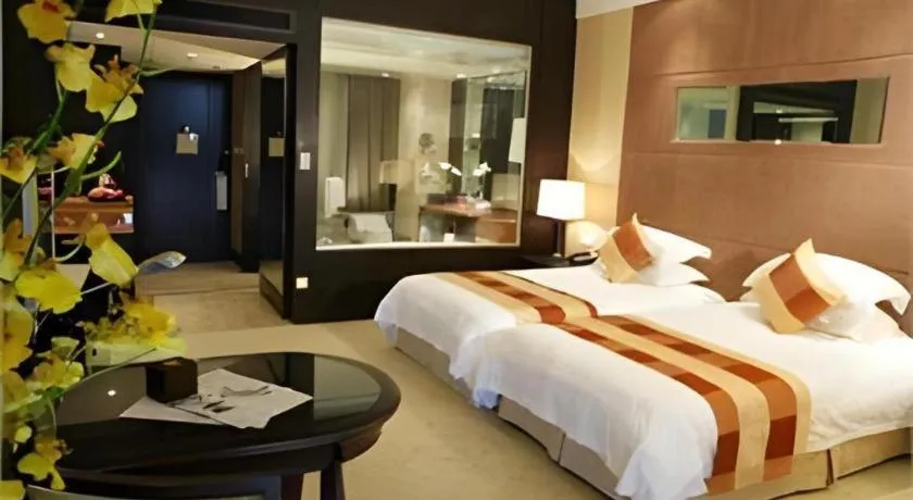 Bed in New Century Grand Hotel Xuzhou