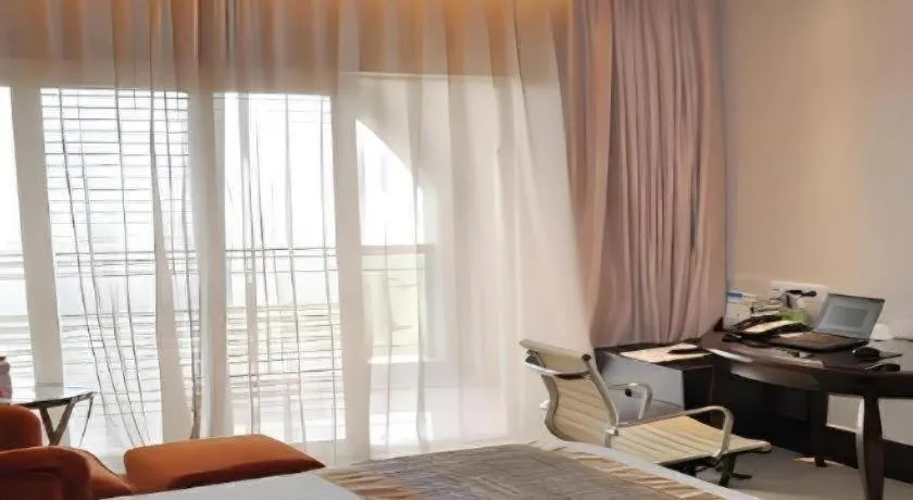 Bed in New Century Grand Hotel Xuzhou