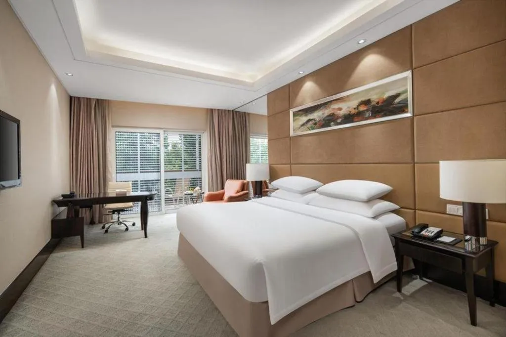 Bed in New Century Grand Hotel Xuzhou