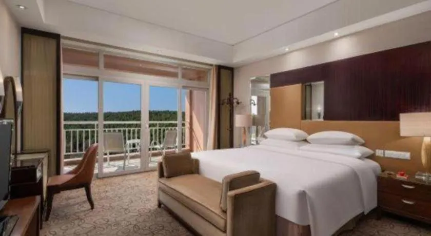 Bed in New Century Grand Hotel Xuzhou