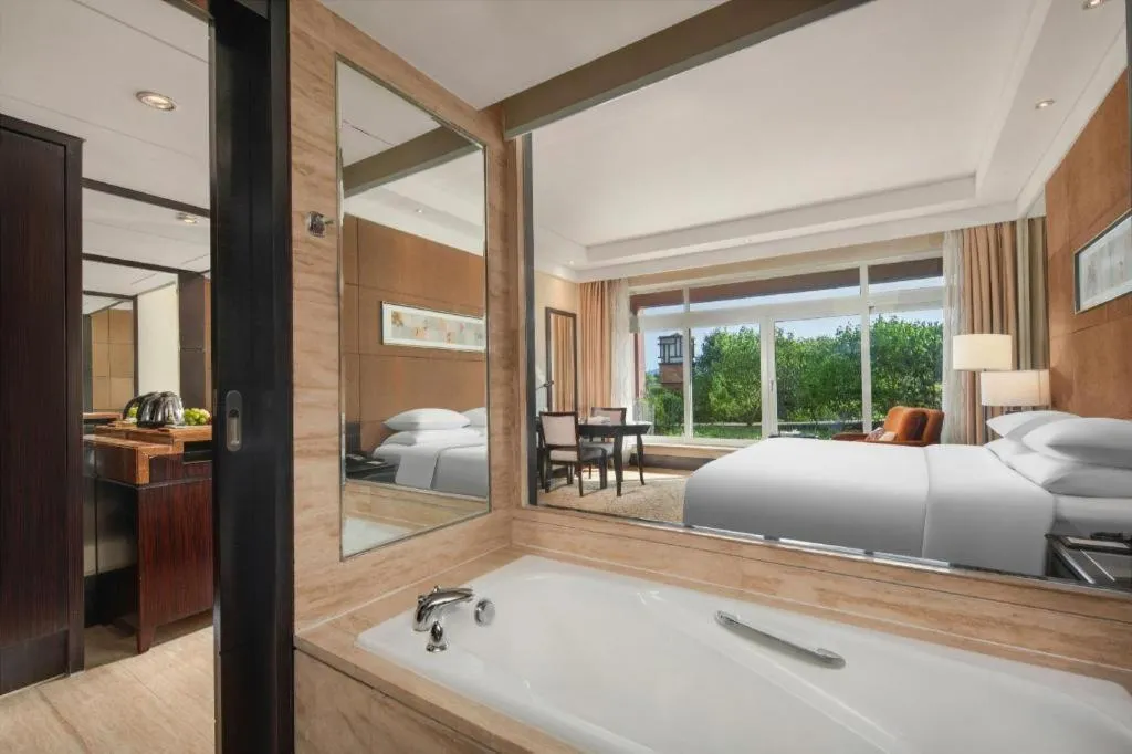 Bed in New Century Grand Hotel Xuzhou