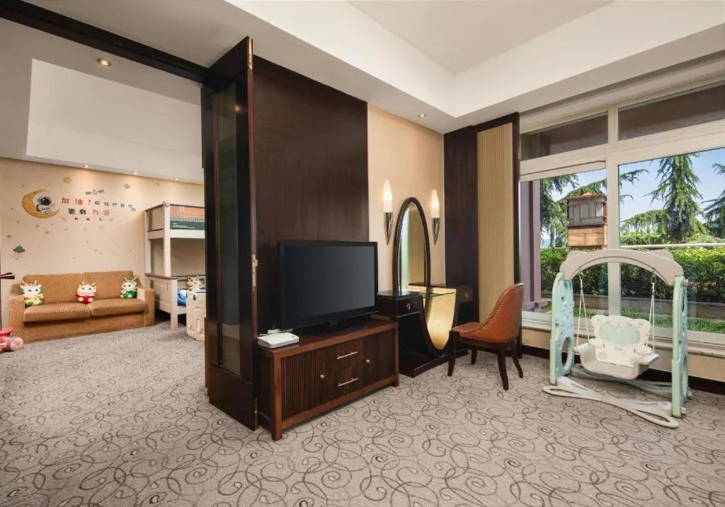 Bed in New Century Grand Hotel Xuzhou