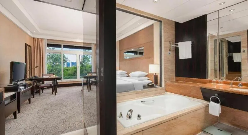 Bed in New Century Grand Hotel Xuzhou