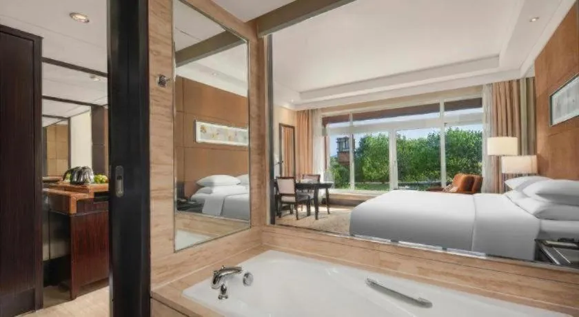 Bed in New Century Grand Hotel Xuzhou