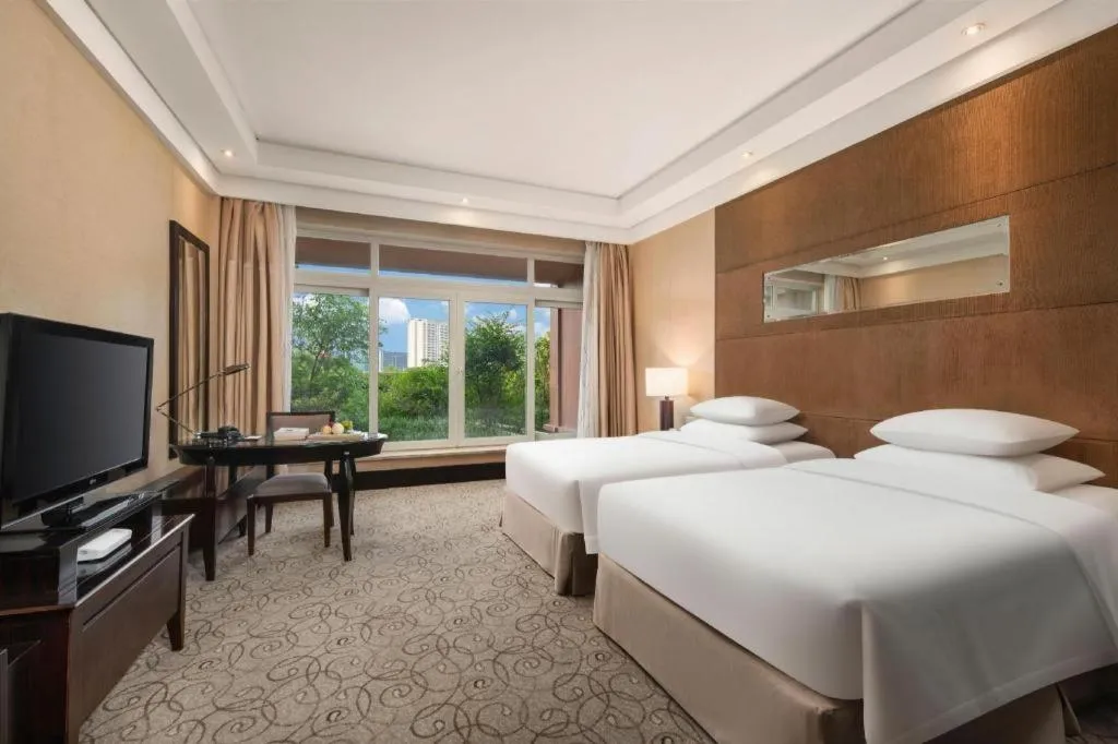 Bed in New Century Grand Hotel Xuzhou