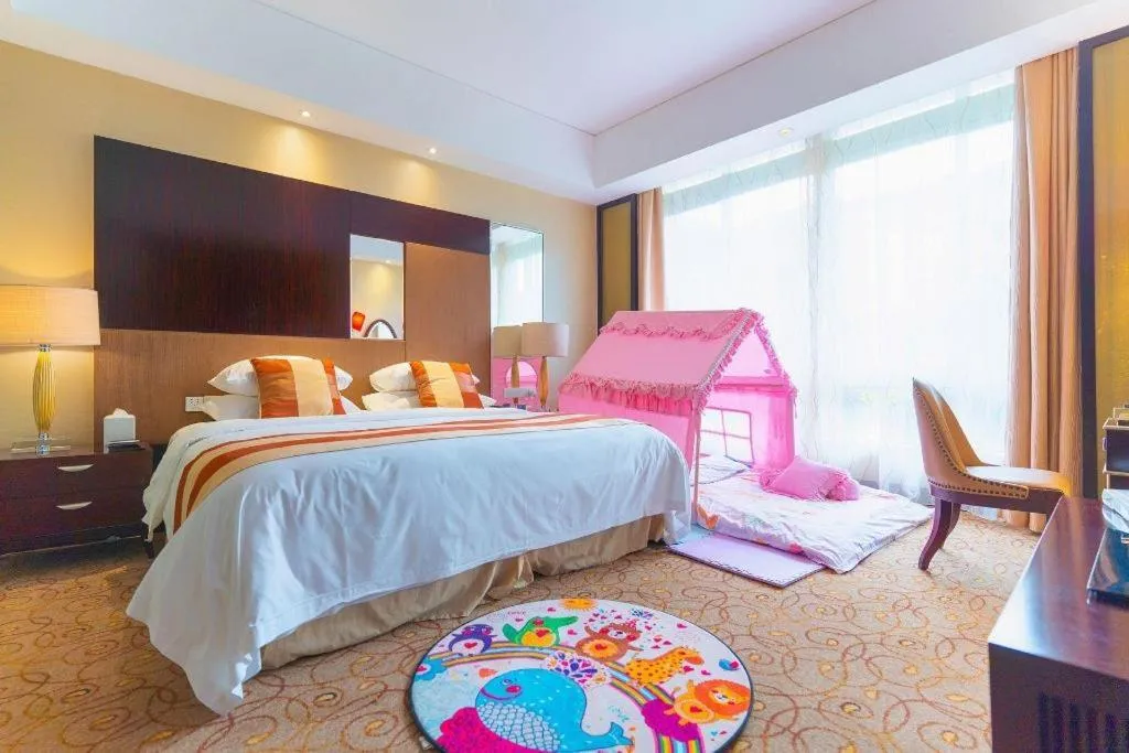 Bed in New Century Grand Hotel Xuzhou