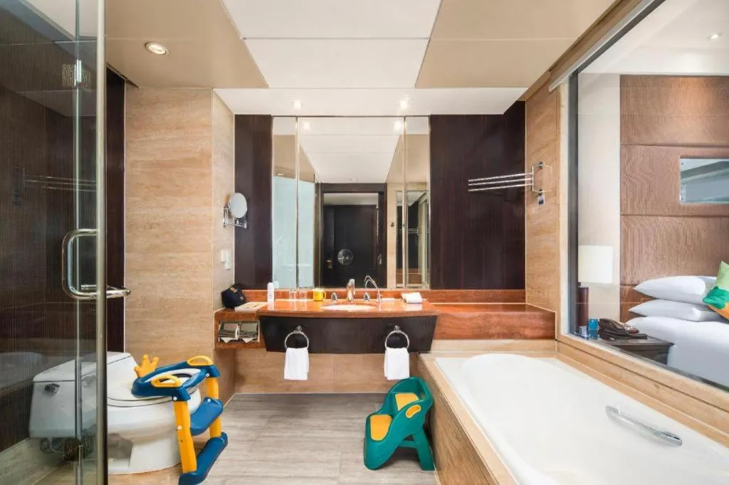 Bed in New Century Grand Hotel Xuzhou