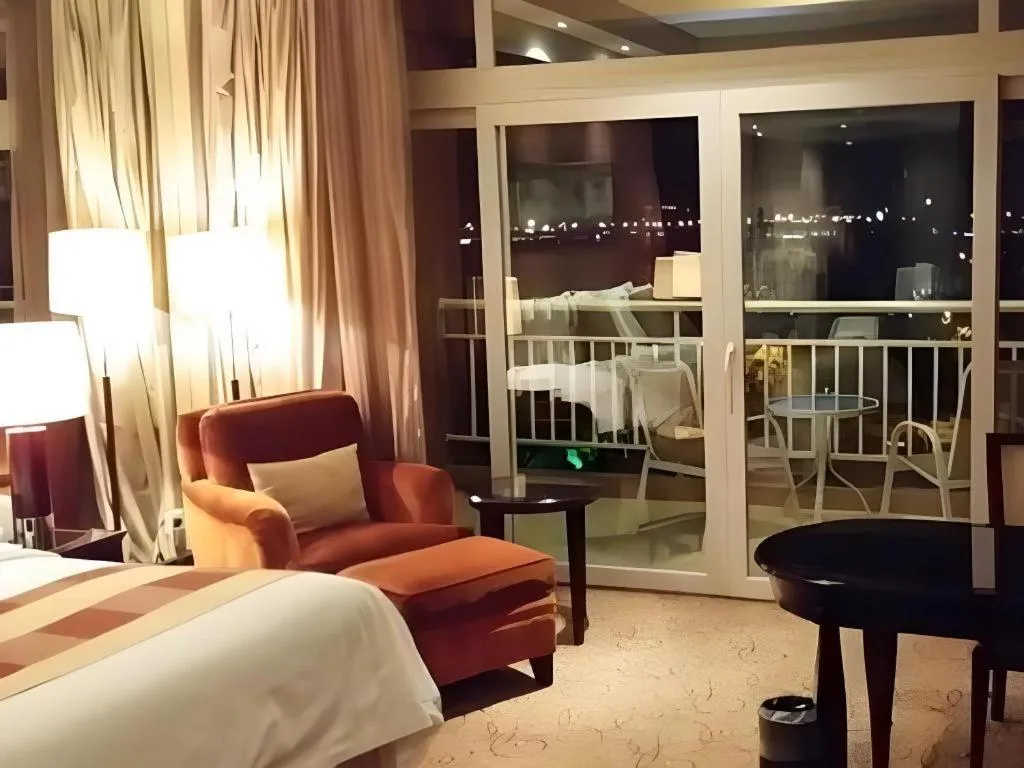 Bed in New Century Grand Hotel Xuzhou