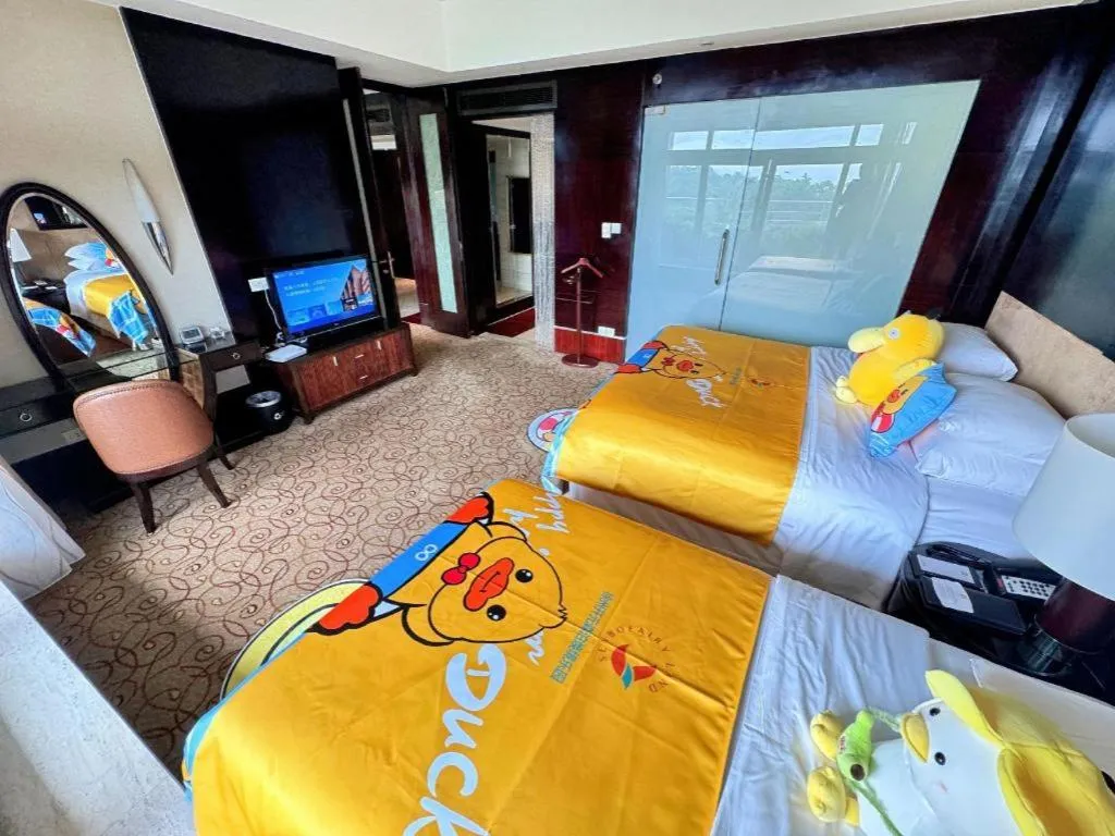 Bed in New Century Grand Hotel Xuzhou