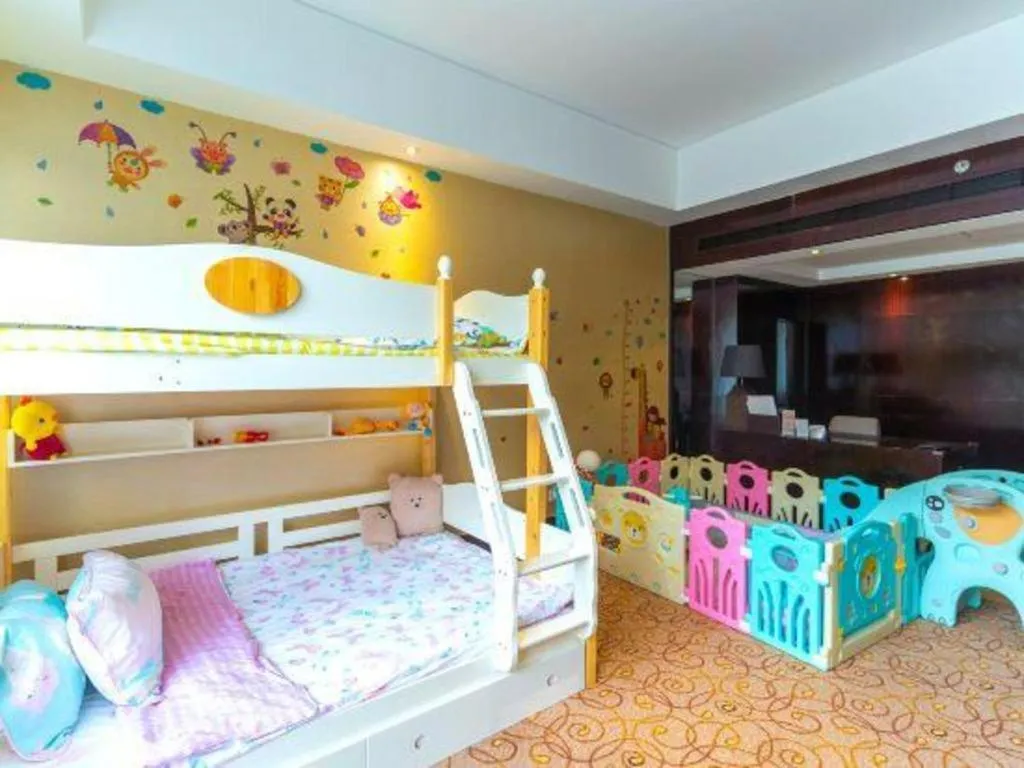 Bed in New Century Grand Hotel Xuzhou