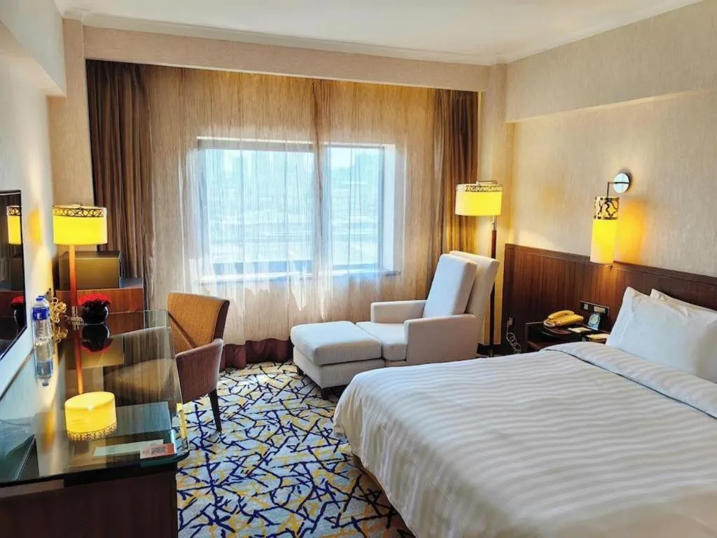 Bed in Xian Grand Noble Hotel