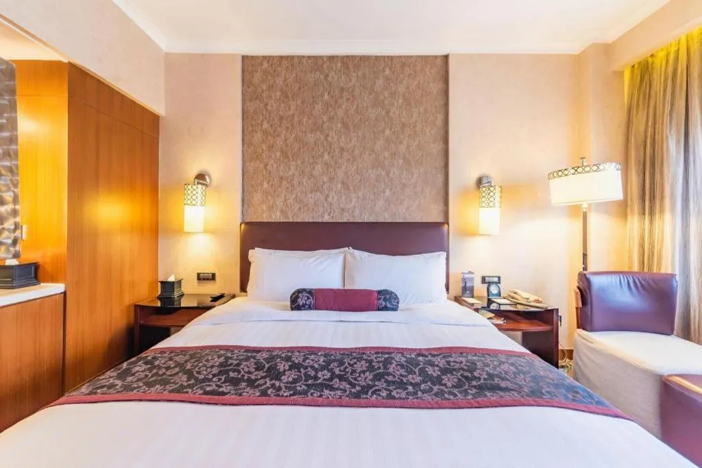 Bed in Xian Grand Noble Hotel