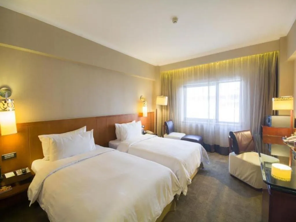 Bed in Xian Grand Noble Hotel