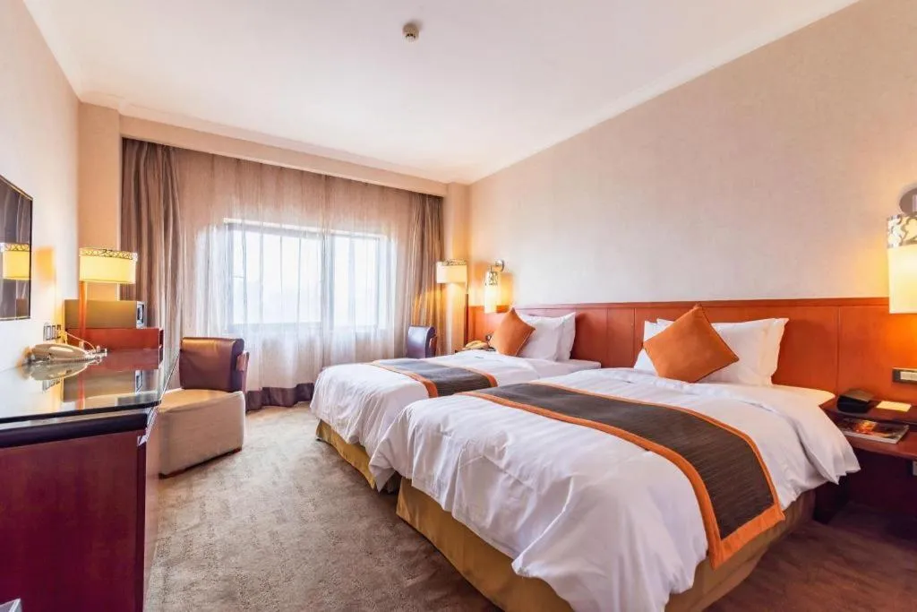 Bed in Xian Grand Noble Hotel