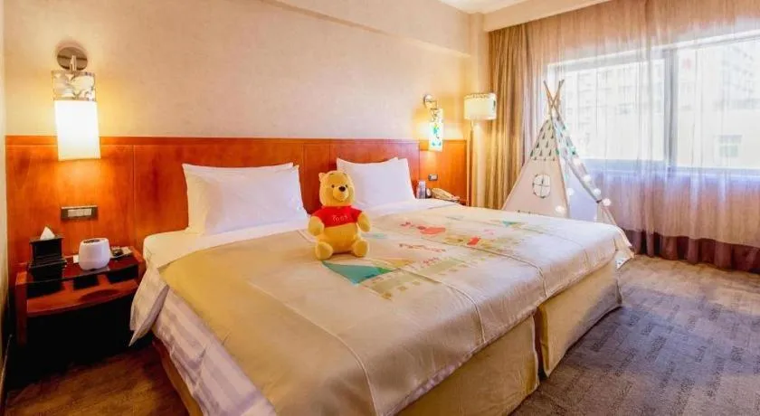 Bed in Xian Grand Noble Hotel