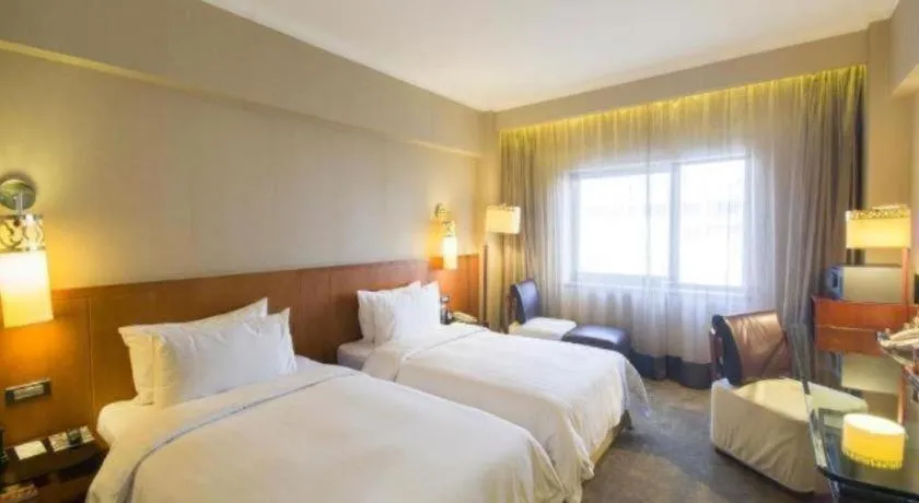 Bed in Xian Grand Noble Hotel