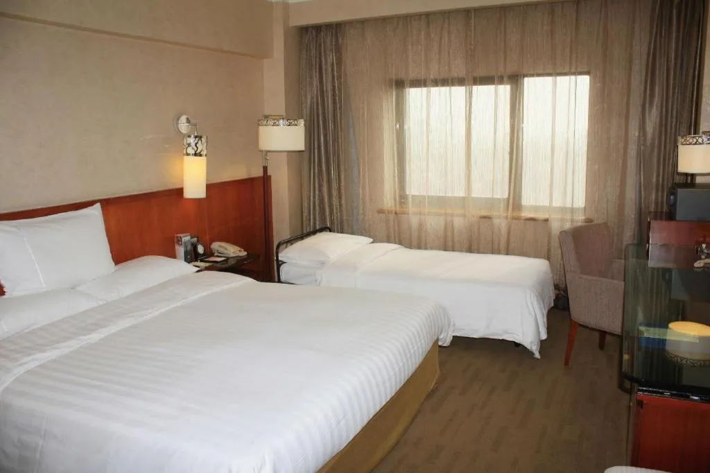 Bed in Xian Grand Noble Hotel