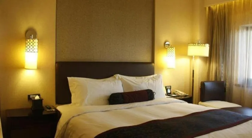 Bed in Xian Grand Noble Hotel