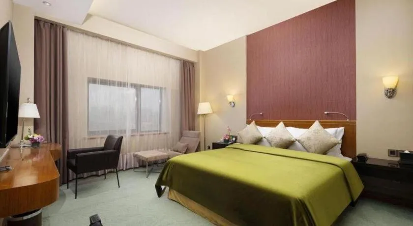 Bed in Xian Grand Noble Hotel