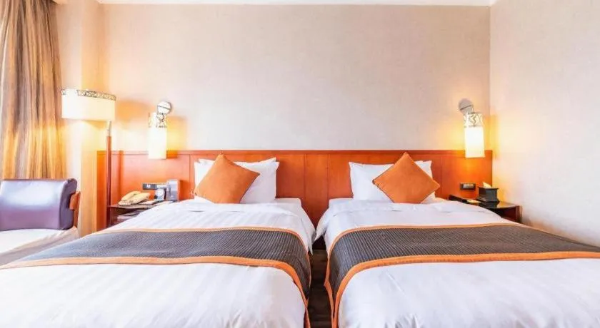 Bed in Xian Grand Noble Hotel