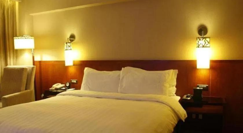 Bed in Xian Grand Noble Hotel