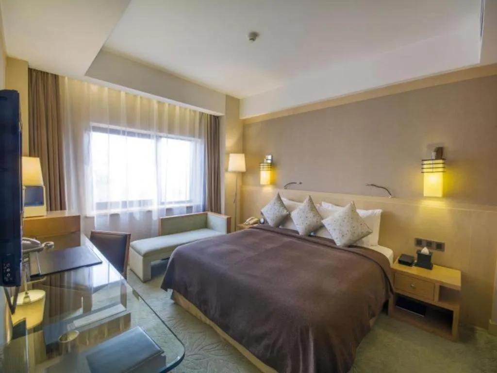 Bed in Xian Grand Noble Hotel