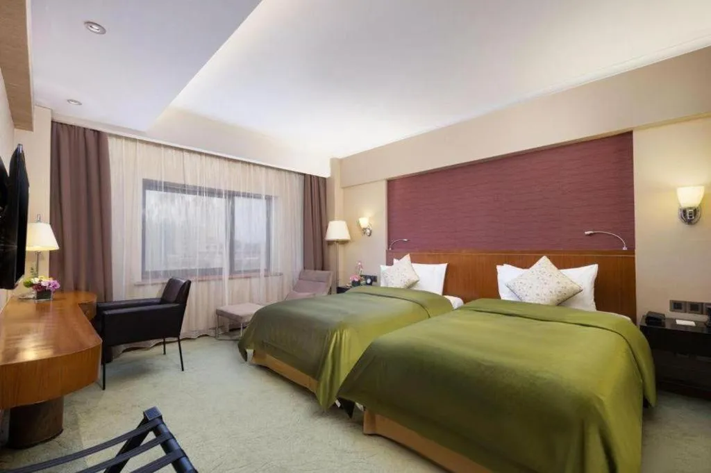 Bed in Xian Grand Noble Hotel