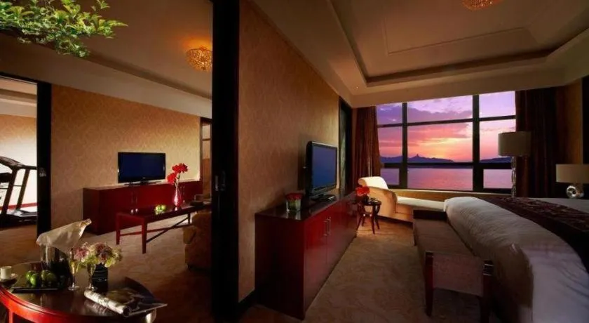 Bed in New Century Hotel Zaozhuang Fengming