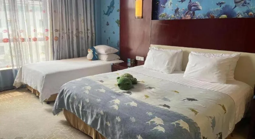 Bed in New Century Hotel Zaozhuang Fengming