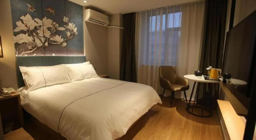 Bed in Magnotel Business Xuzhou Jinying Sudi Road Metro Station