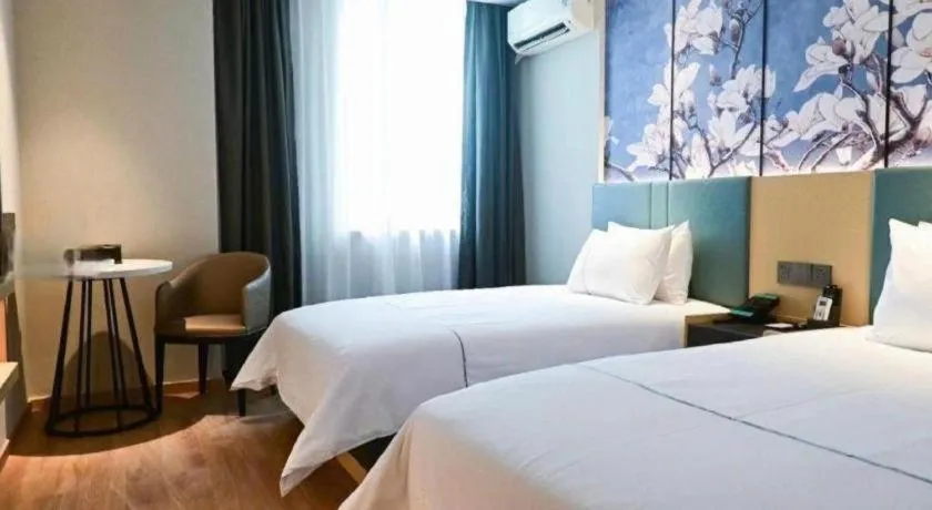 Bed in Magnotel Business Xuzhou Jinying Sudi Road Metro Station