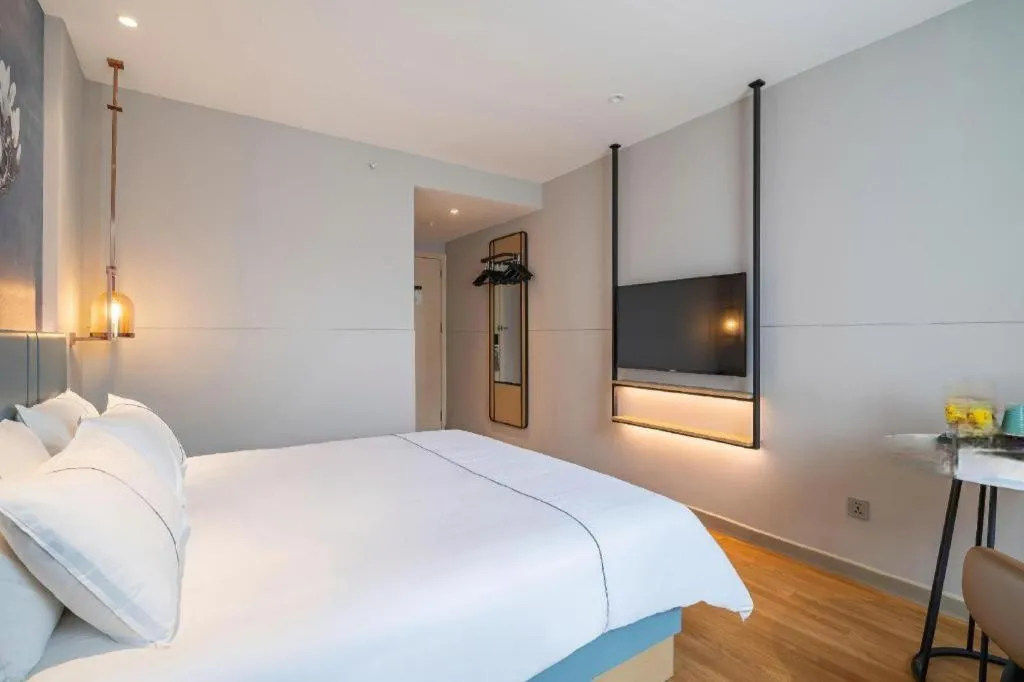 Bed in Magnotel Business Xuzhou Jinying Sudi Road Metro Station