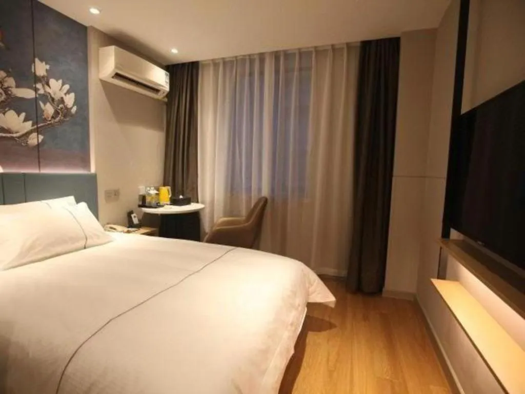 Bed in Magnotel Business Xuzhou Jinying Sudi Road Metro Station