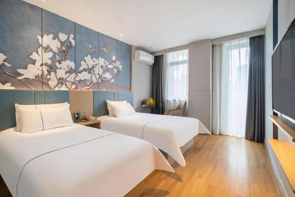 Bed in Magnotel Business Xuzhou Jinying Sudi Road Metro Station