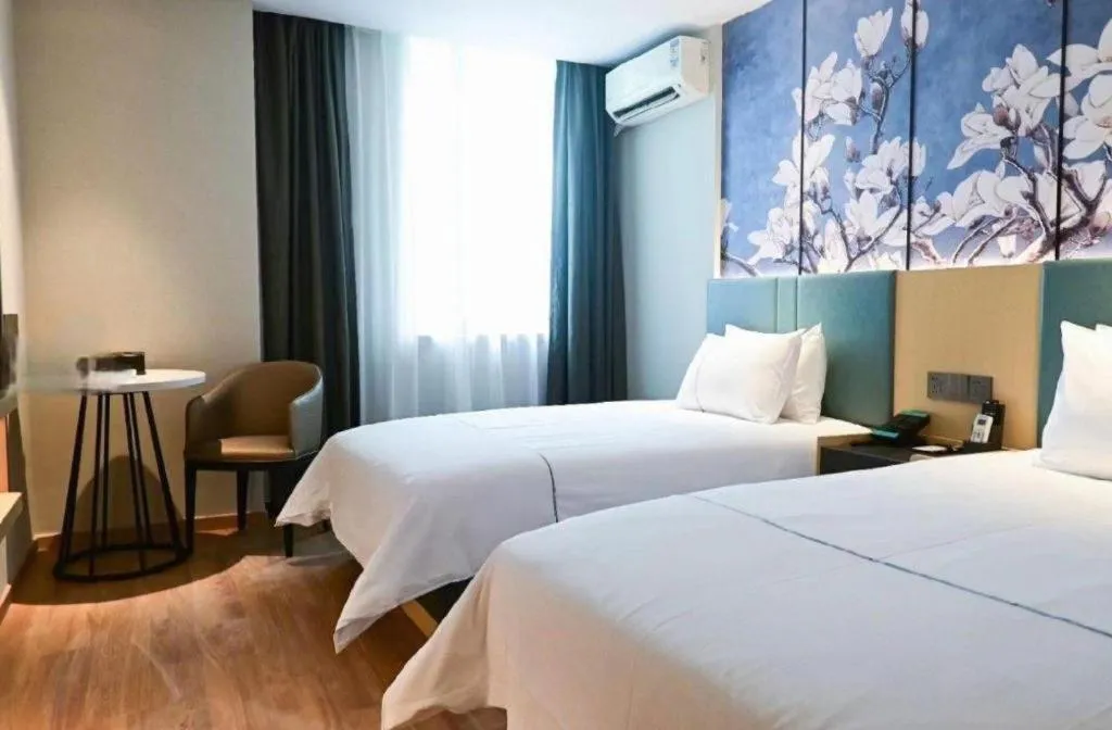 Bed in Magnotel Business Xuzhou Jinying Sudi Road Metro Station