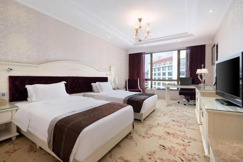 Bed in Guilin Bravo Hotel Grand Wing