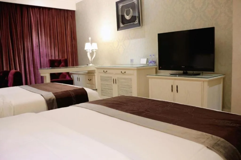 Bed in Guilin Bravo Hotel Grand Wing