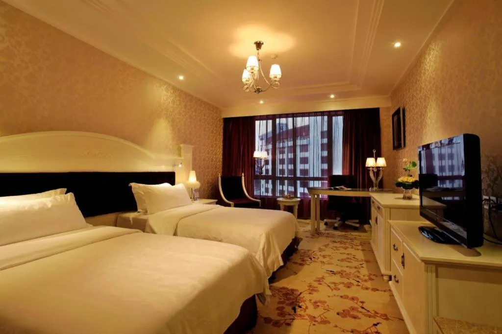 Bed in Guilin Bravo Hotel Grand Wing