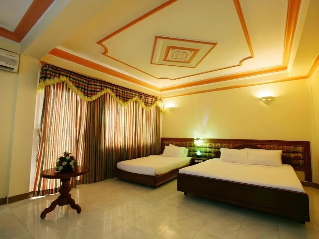 Bed in Lucky Star Hotel