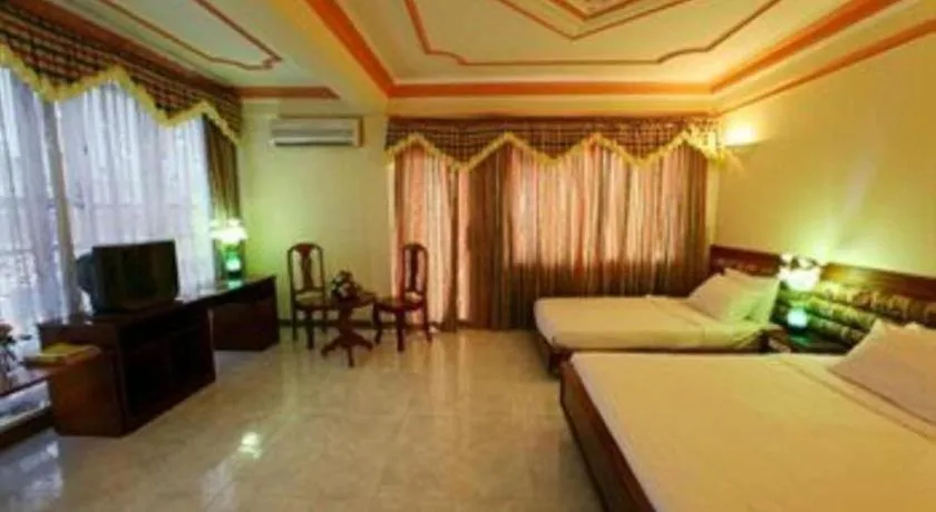 Bed in Lucky Star Hotel