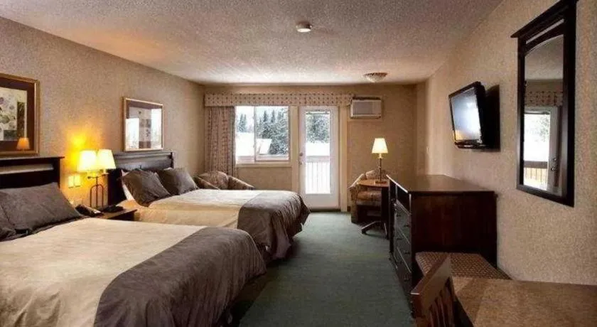 Bed in Coast High Country Inn