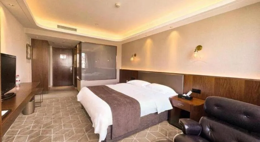 Bed in Guilin Plaza Hotel