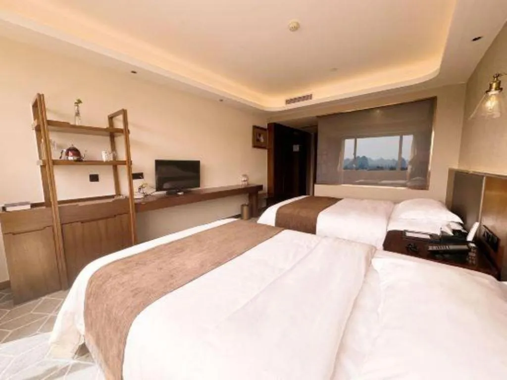 Bed in Guilin Plaza Hotel