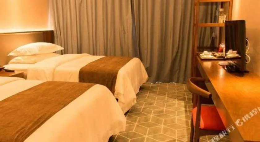 Bed in Guilin Plaza Hotel