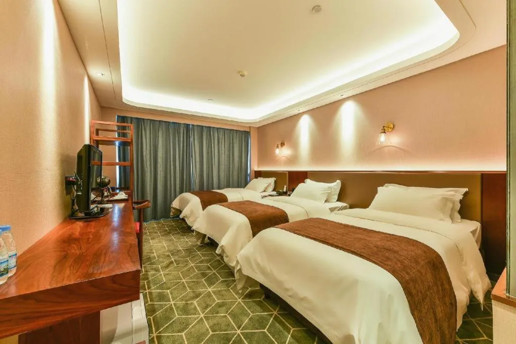 Bed in Guilin Plaza Hotel