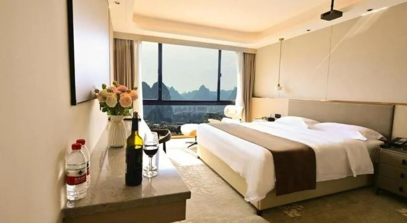 Bed in Guilin Plaza Hotel