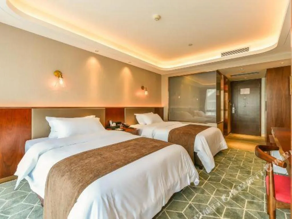 Bed in Guilin Plaza Hotel