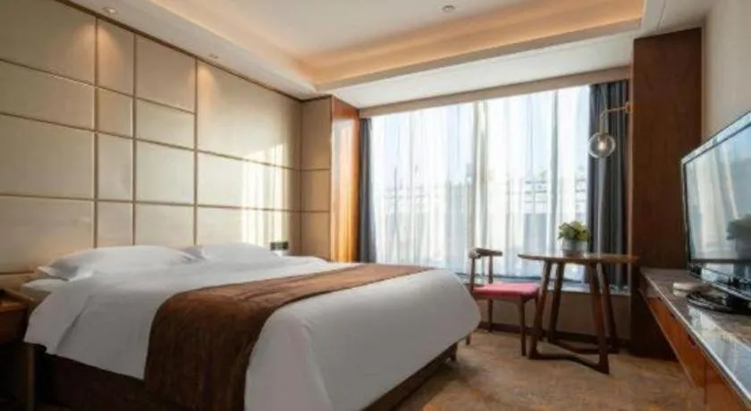 Bed in Guilin Plaza Hotel