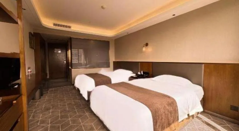 Bed in Guilin Plaza Hotel
